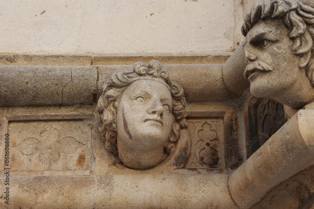Fototapeta premium SIBENIK, CROATIA-June 05,2024: view of St James cathedral in Sibenik, UNESCO world heritage site in Croatia. Sibenik, The Cathedral, Croatia. Famous faces on the side protal of Sibenik cathedral.