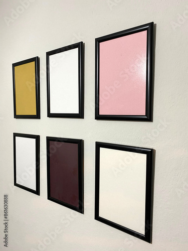 Empty Picture Frames on Wall