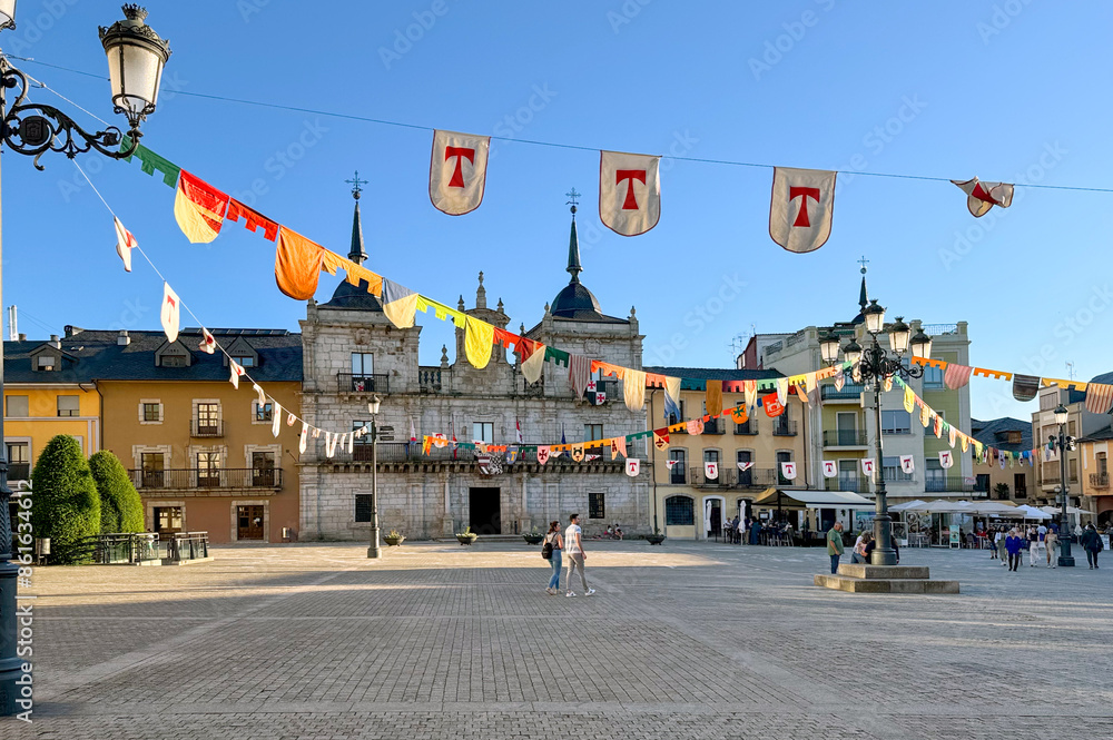 Fototapeta premium View of Ponferrada town hall building and square decorated for Templar Knights festivity.