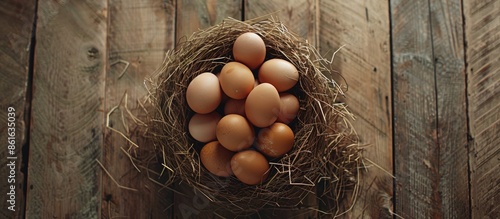 A stack of brown eggs in a ...