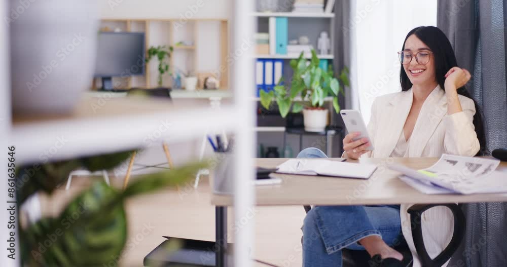 Happy Woman in Office Manages Business Using Smartphone Happy Woman in Office Manages Business Using Smartphone