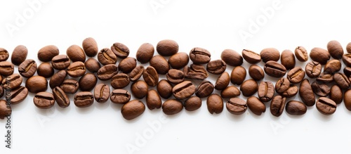 Coffee beans on a white bac...