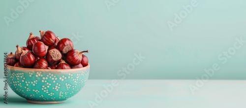 Horse chestnuts in bowl on ...