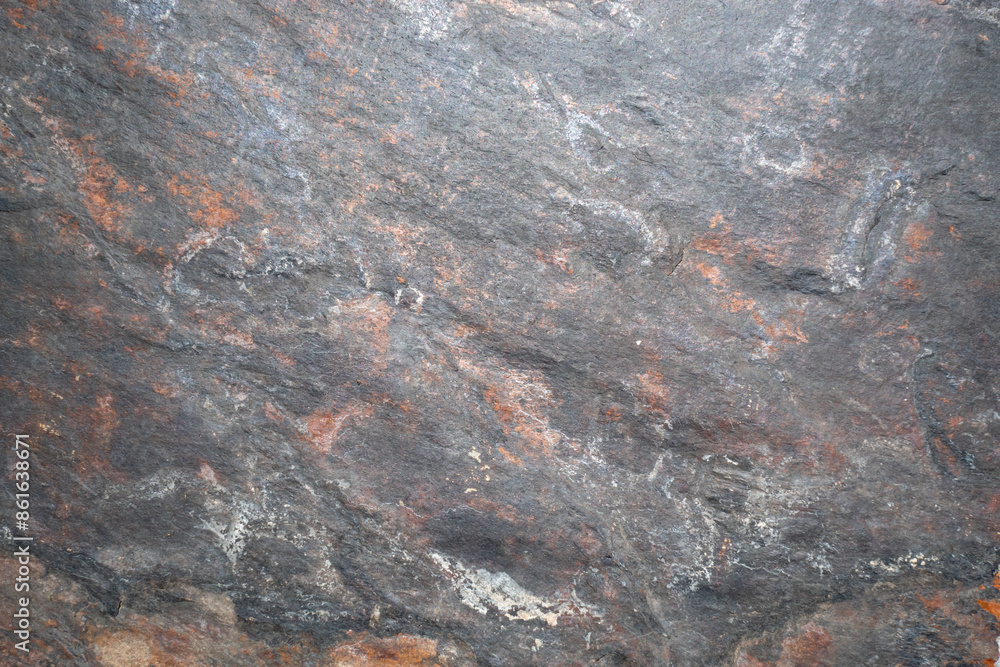 Textura de uma rocha de xisto com pequenas fissuras e detalhes naturais Textura de uma rocha de xisto com pequenas fissuras e detalhes naturais