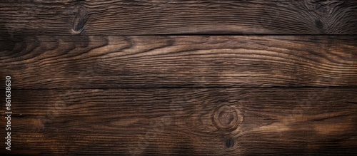 Aged dark wood surface with...