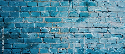 A light blue brick wall's t...