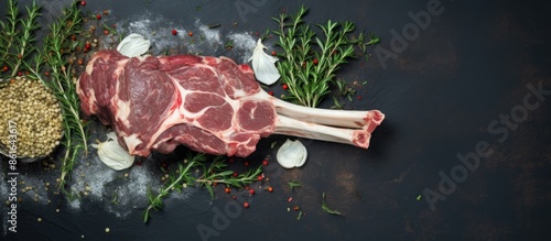 Uncooked lamb shanks and mu...