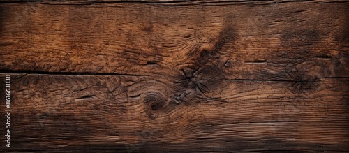 Aged dark wood surface with...