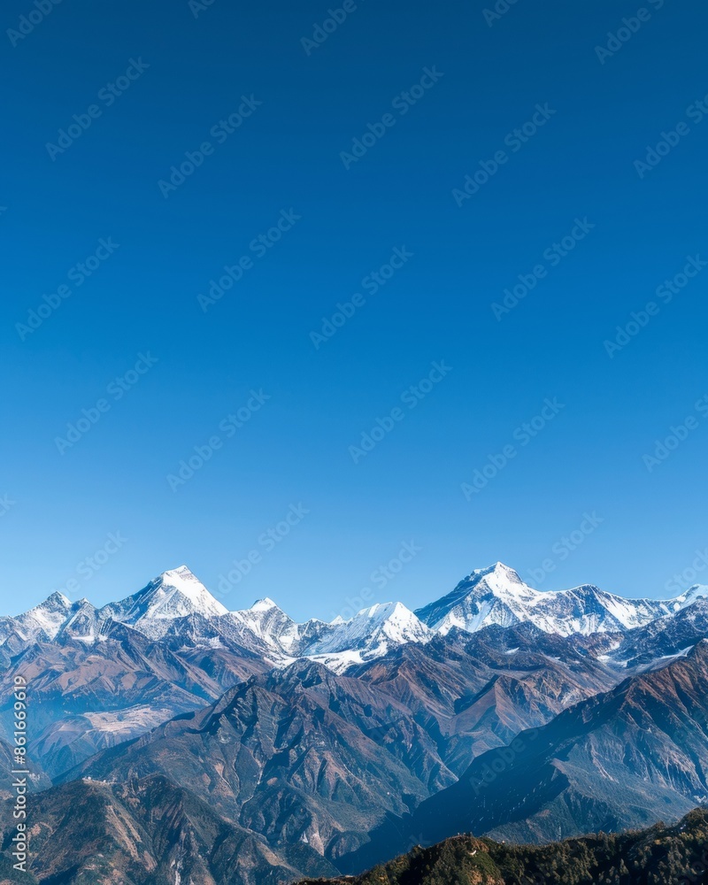 Majestic Snow-Capped Peaks of the Himalayan Mountains Under Clear Blue Sky Majestic Snow-Capped Peaks of the Himalayan Mountains Under Clear Blue Sky