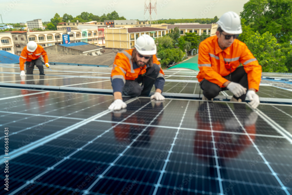 engineer man inspects construction of solar cell panel or photovoltaic cell by electronic device. Industrial Renewable energy of green power. factory worker working on tower roof. engineer man inspects construction of solar cell panel or photovoltaic cell by electronic device. Industrial Renewable energy of green power. factory worker working on tower roof.