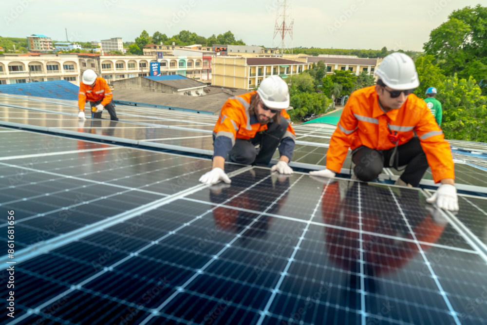 engineer man inspects construction of solar cell panel or photovoltaic cell by electronic device. Industrial Renewable energy of green power. factory worker working on tower roof. engineer man inspects construction of solar cell panel or photovoltaic cell by electronic device. Industrial Renewable energy of green power. factory worker working on tower roof.