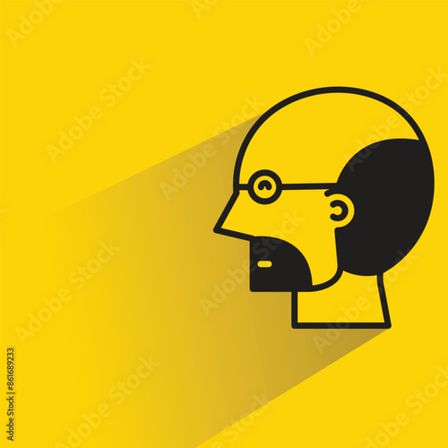 bald man icon with shadow on yellow background