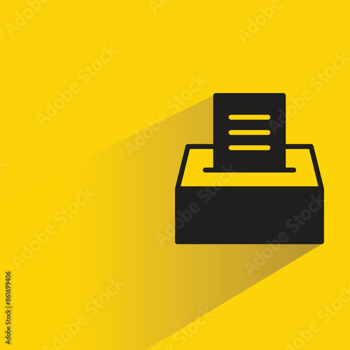 vote box with shadow on yellow background