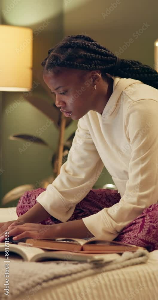 University, bed and black woman on laptop at night for online research, studying and learning. Education, academy and female student on computer for knowledge, typing project and website in bedroom University, bed and black woman on laptop at night for online research, studying and learning. Education, academy and female student on computer for knowledge, typing project and website in bedroom