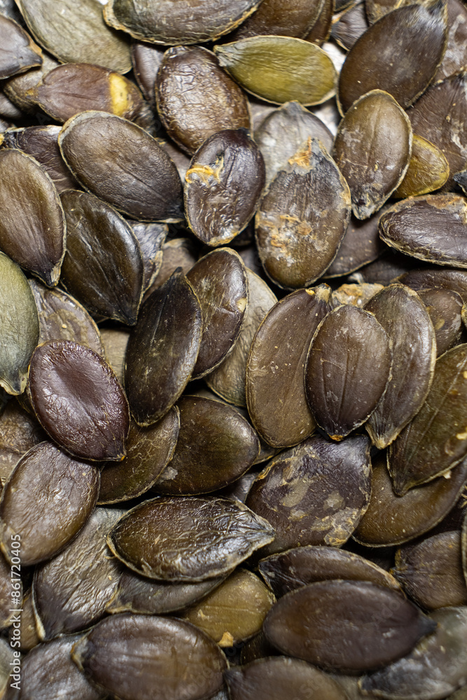 Peeled pumpkin seeds, kernels close-up Peeled pumpkin seeds, kernels close-up