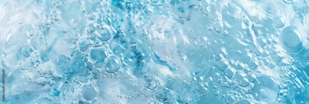 Rippled clear blue water with bubbles background. Transparent aquatic surface texture Rippled clear blue water with bubbles background. Transparent aquatic surface texture