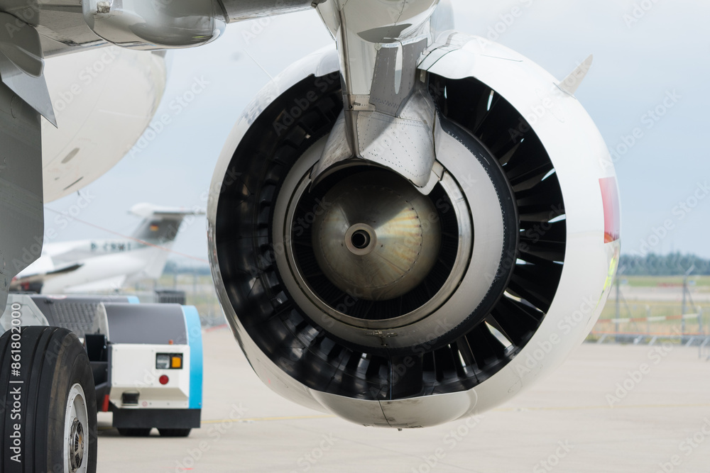 Engine of a jet passenger aircraft, close-up. Engine of a jet passenger aircraft, close-up.