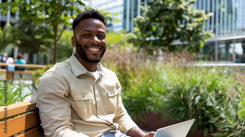 Fototapeta premium Office worker enjoying park bench, laptop and coffee, high-rise buildings background. Modern city worker on park bench, laptop open, coffee cup beside.