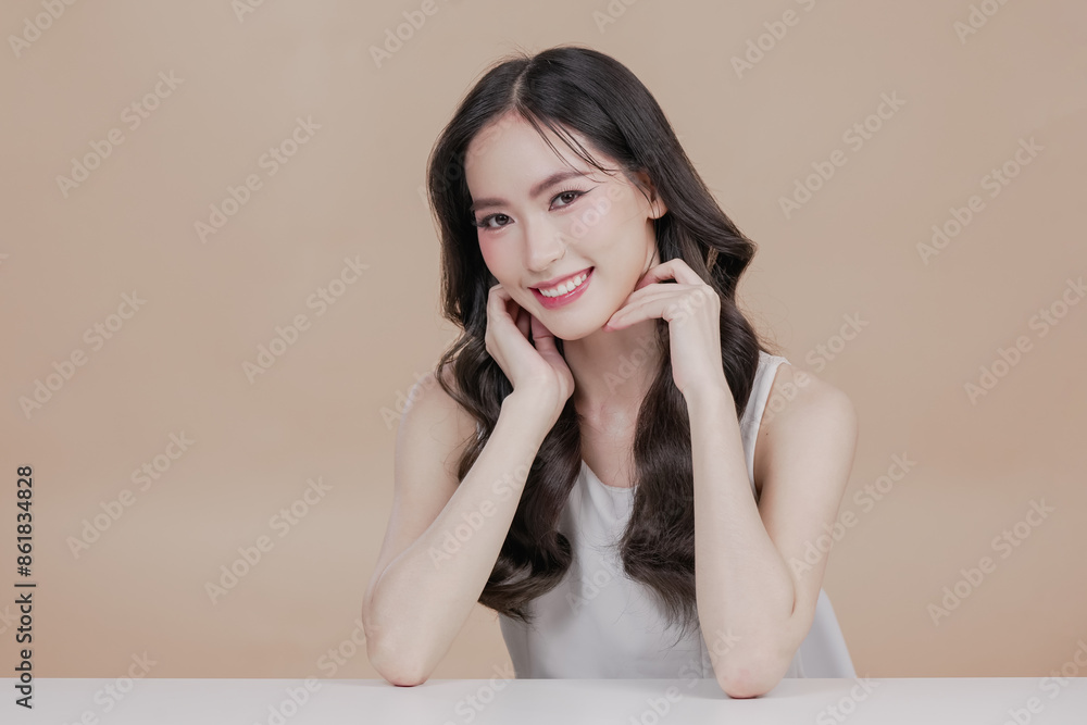 young asian woman with clean fresh skin on beige background, Cosmetics, Face care, Facial treatment, Cosmetology, beauty and spa, Asian women portrait. woman with make up brush cosmetic Beautiful young asian woman with clean fresh skin on beige background, Cosmetics, Face care, Facial treatment, Cosmetology, beauty and spa, Asian women portrait. woman with make up brush cosmetic Beautiful