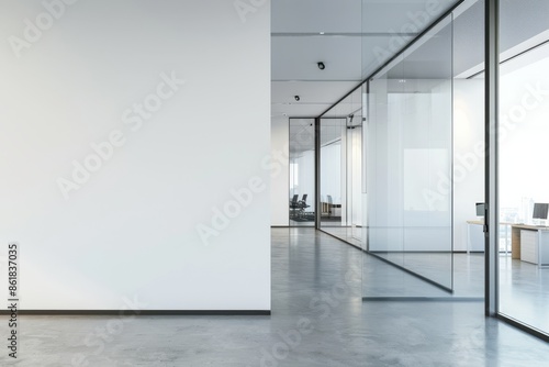 A blank white wall in a modern office setting, perfect for advertising space, promotional displays, and mockups needing a clean and professional backdrop