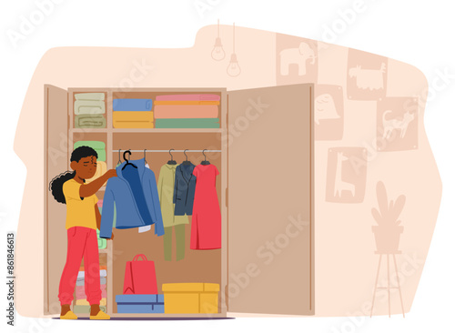 Young Girl Organizing Clothes In Her Wardrobe. The Room Is Clean And Well-organized With Shelves And Storage Boxes