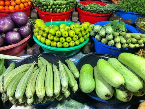 Vegetables displayed in a kacha bazaar in Bangladesh photo