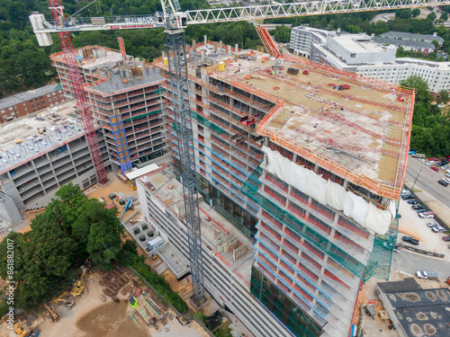 Daytime Drone Images of Highrise Construction and the Skyline in Downtown Raleigh North Carolina. Industry, Architecture, Engineering