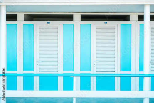Fototapeta Naklejka Na Ścianę i Meble -  Louvered doors to changing rooms at beach in Italy