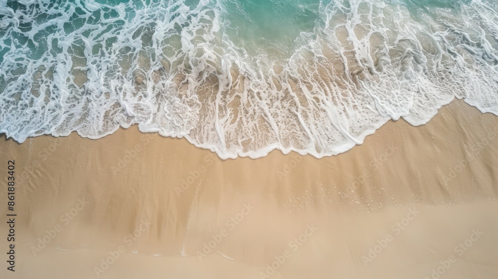 Obraz premium photo of the beach. sand and water, top view.