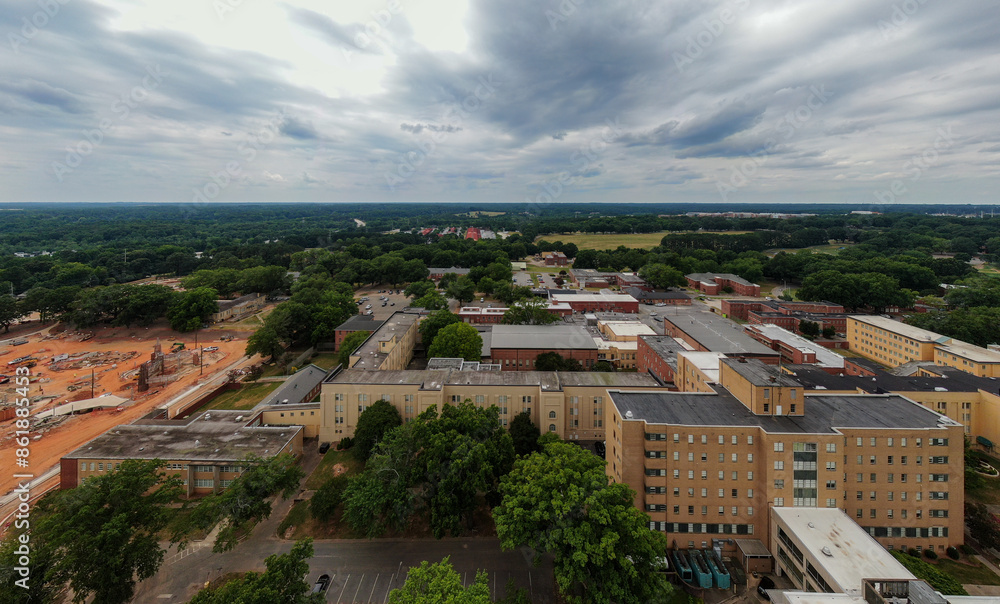 Fototapeta premium Day Light Drone Images of Dorothea Dix Park and The Downtown Raleigh North Carolina Skyline Featuring Gipson Play Plaza Under Construction. Travel, Parks, Outdoors, Nature, Urban