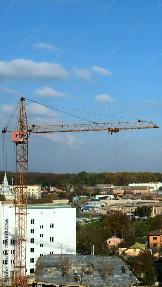 Time lapse builders and cranes working on the construction site