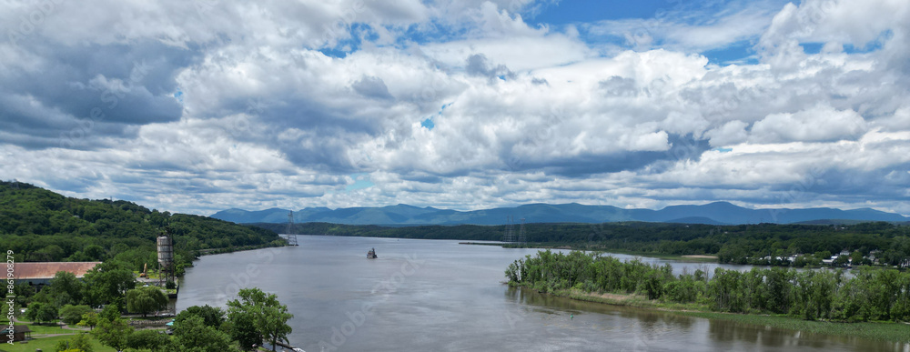 view of the hudson river and catskills mountains from a park in hudson new york valley (lighthouse, water clouds harbor coastline scene) aerial beautiful travel destination ny state public land view of the hudson river and catskills mountains from a park in hudson new york valley (lighthouse, water clouds harbor coastline scene) aerial beautiful travel destination ny state public land