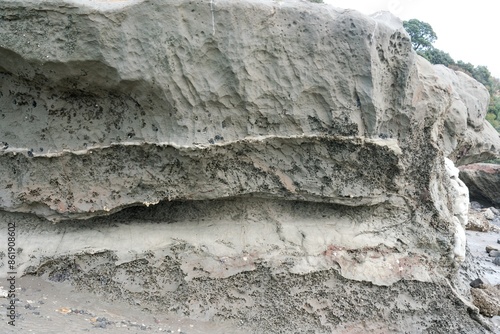фотографія Close-up of the holey coastal rock texture