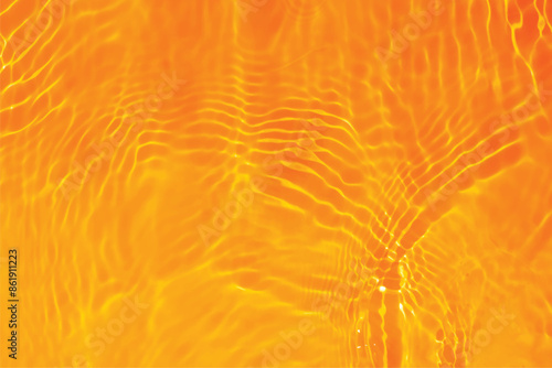 Orange water with ripples on the surface. Defocus blurred transparent blue colored clear calm water surface texture with splashes and bubbles. Water waves with shining pattern texture background.