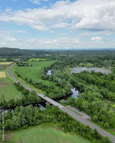 aerial view of esopus creek near kingston new york (electrical power station and bridge with road) farmland farming farm  photo