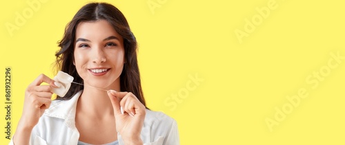 Smiling young woman with de...