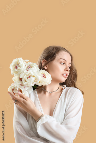 Beautiful young woman with ...