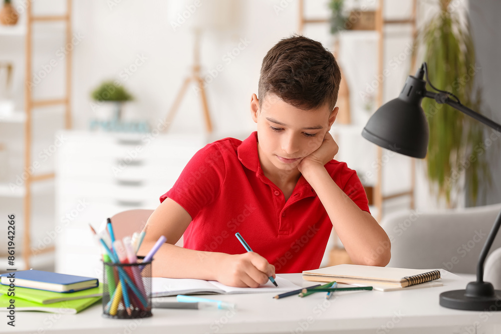 Little boy doing lessons at home Little boy doing lessons at home