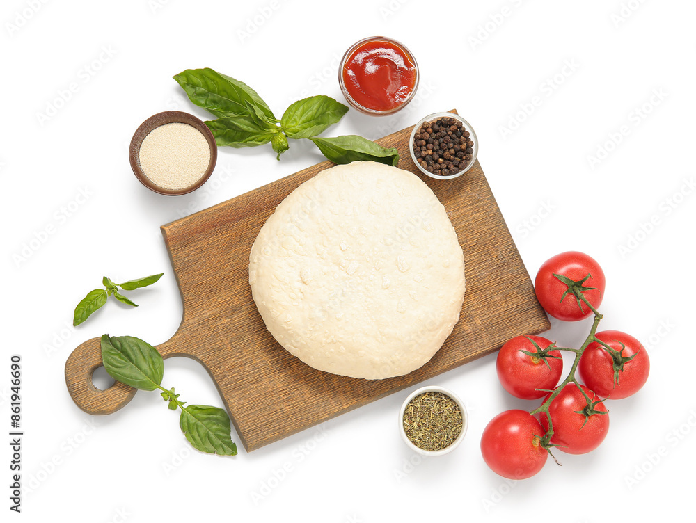 Raw dough and ingredients for preparing pizza on white background Raw dough and ingredients for preparing pizza on white background