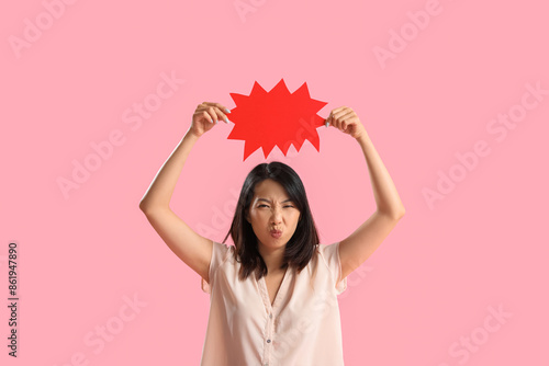 Angry Asian woman with blan...