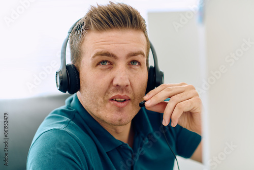 Close Up Portrait of a Customer Support Representative in a Call Center Environment. photo