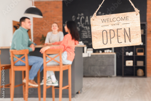 OPEN sign in coffee shop, c...