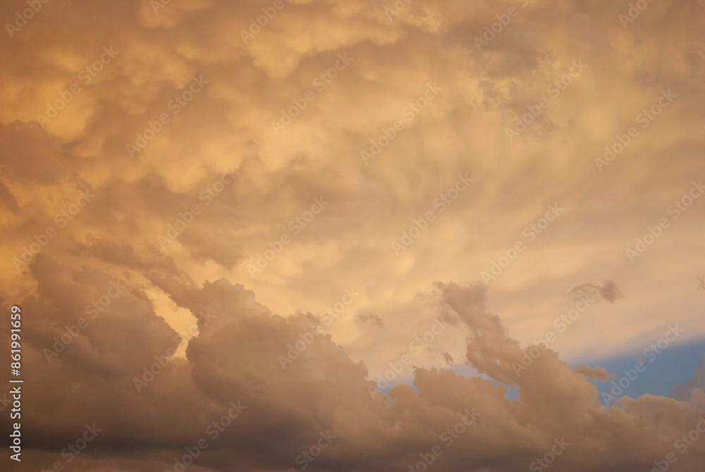 Fototapeta premium storm clouds illuminated by the sun