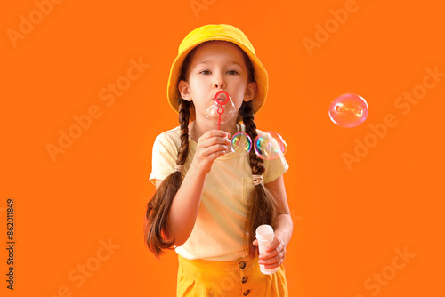 Cute little girl blowing so...