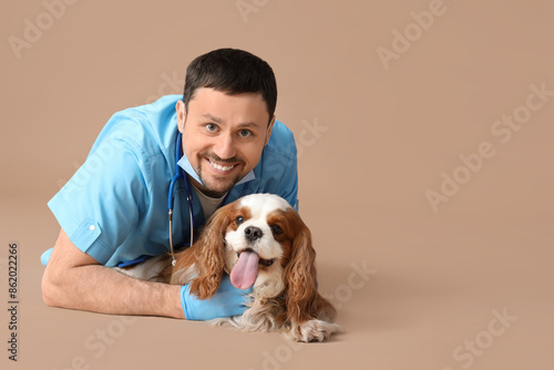 Male veterinarian with cute...