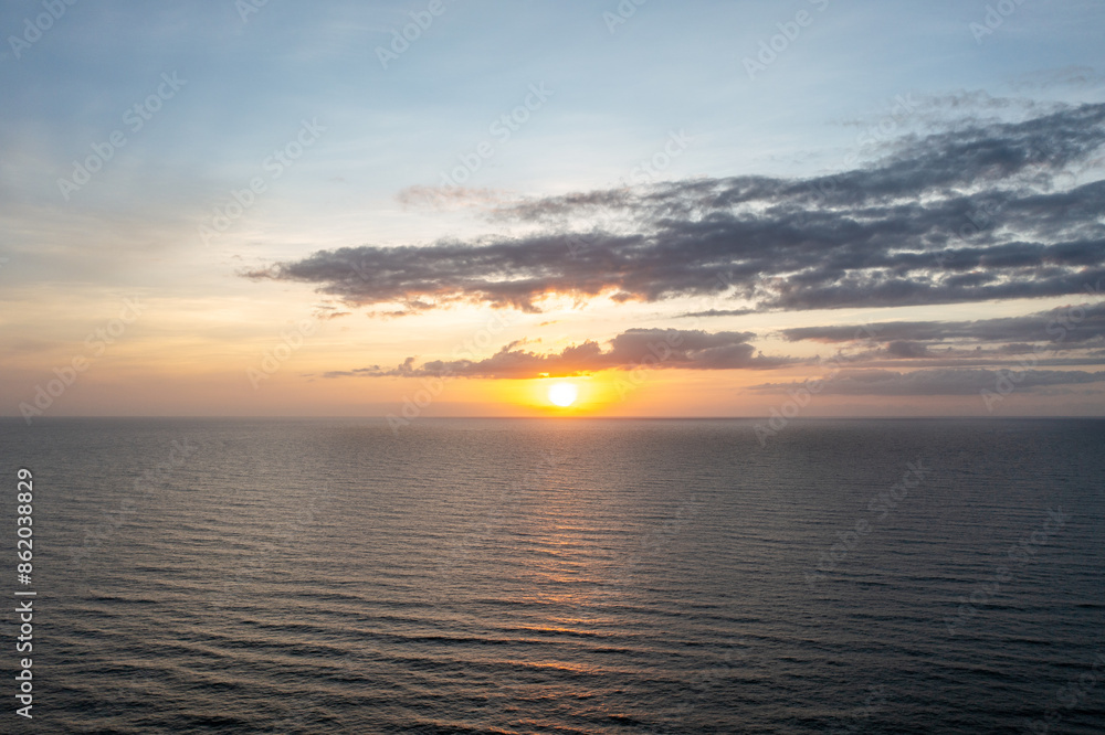 Obraz premium Aerial View of the Atlantic Ocean Sunrise at the Cape Hatteras National Seashore in the Outer Banks North Carolina