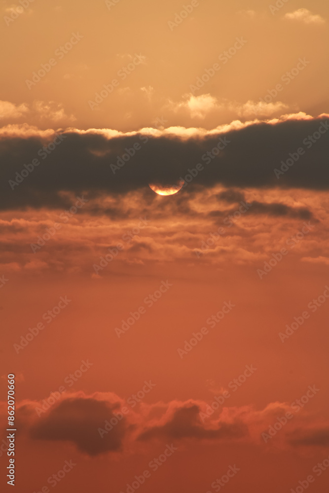 Close up view of sun hidden behind clouds photography Close up view of sun hidden behind clouds photography