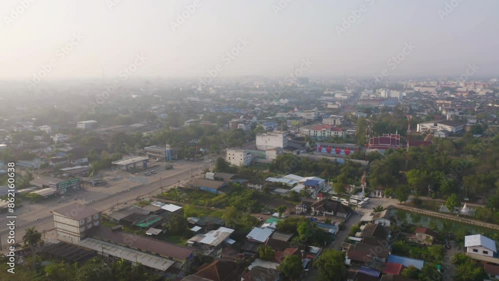 Aerial view of local residential neighborhood roofs. Urban housing development from above. Top view. Real estate in Isan urban city town, Thailand. Property real estate. Aerial view of local residential neighborhood roofs. Urban housing development from above. Top view. Real estate in Isan urban city town, Thailand. Property real estate.