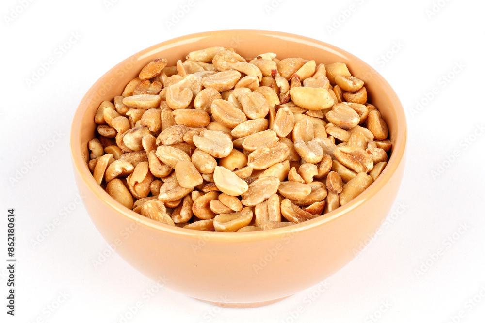 roasted peeled peanuts in ceramic bowl isolated on white background roasted peeled peanuts in ceramic bowl isolated on white background