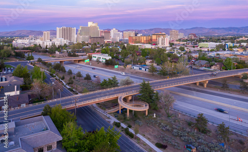 Obraz na płótnie Bridge crossing the Interstate 80 and downtown Reno at sunrise, Nevada, United State of America